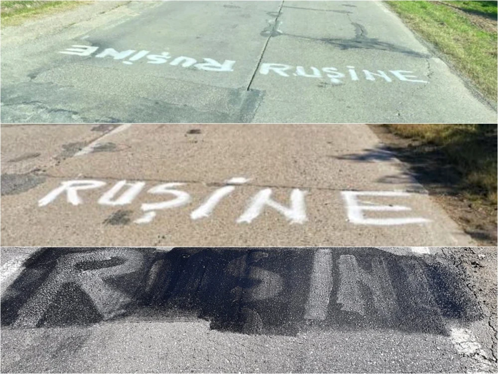 Drumarii au încercat să acopere cu vopsea neagră cuvântul ”ruşine”. Foto apuseni.info