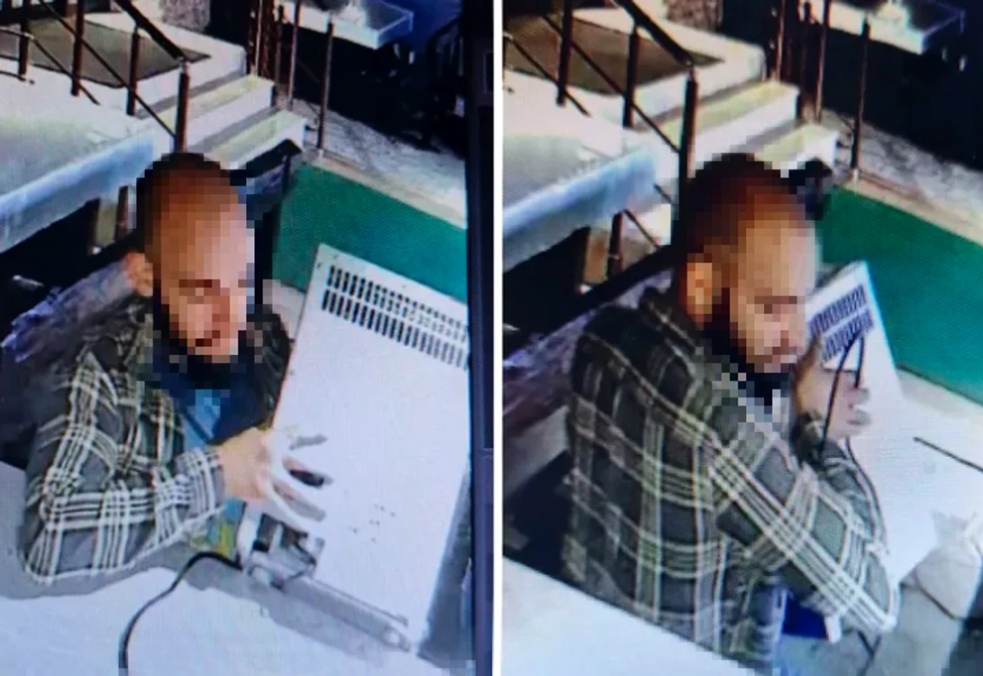 Bărbatul care a fugit cu frigiderul de pe terasa unei pensiuni din Vama Veche FOTO captură video
