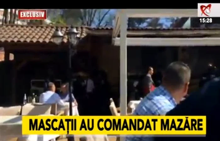 Radu Mazăre, ridicat de mascaţi de la o terasă din Herăstrău. (captură Realitatea TV)