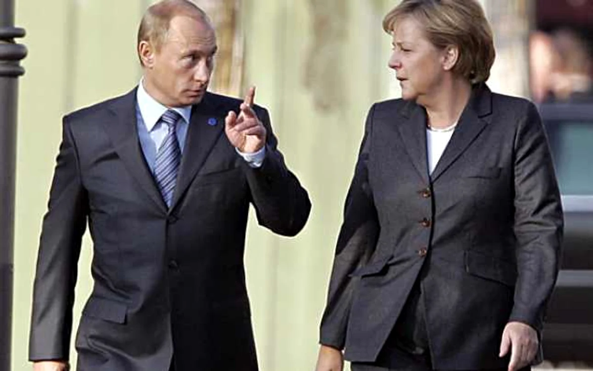 Vladimir Putin pare sa o avertizeze pe Angela Merkel