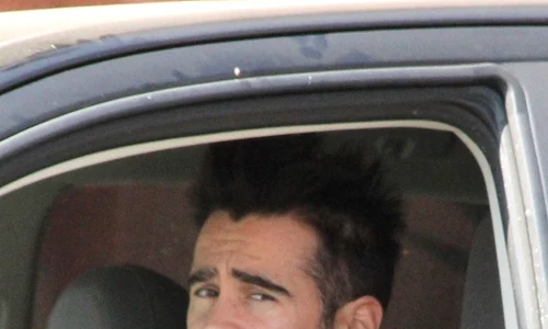 Scruffy looking Colin Farrell stops his truck to look for something in Los Angeles jpeg