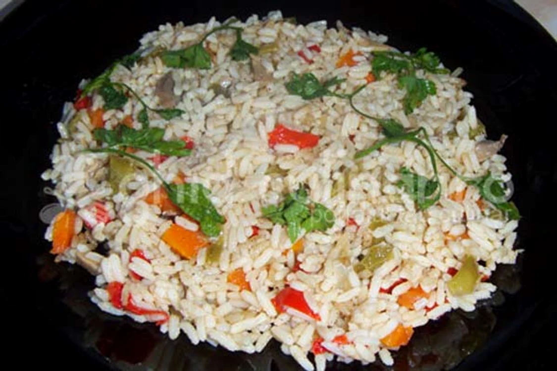 
    O delicioasă reţetă de pilaf de orez cu verdeţuri   