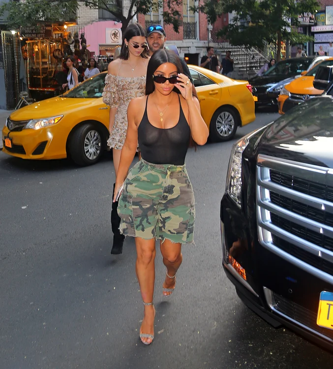 Kim Kardashian and sister Kendall Jenner pictured shopping together in New York City jpeg