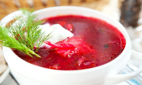 15544951   red borscht with dill and sour cream  soup jpeg