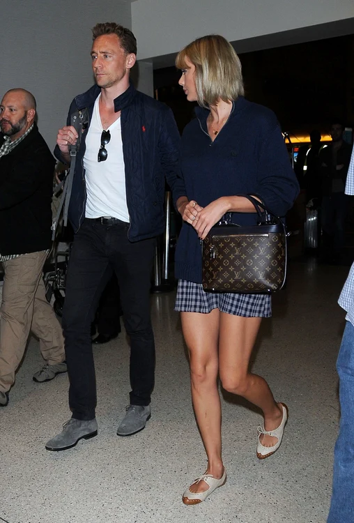 Taylor Swift & Tom Hiddleston Arriving On A Flight At LAX jpeg