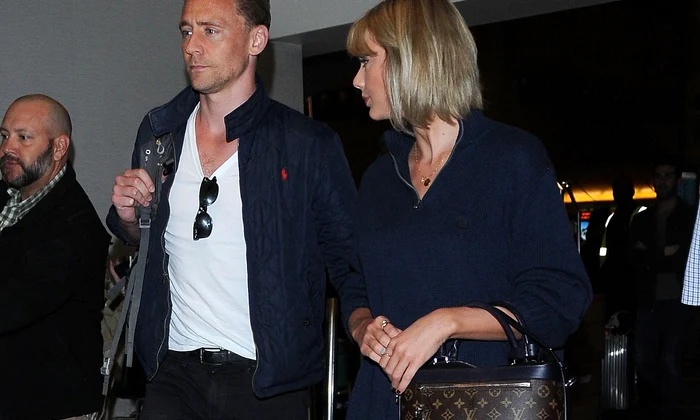 Taylor Swift & Tom Hiddleston Arriving On A Flight At LAX jpeg