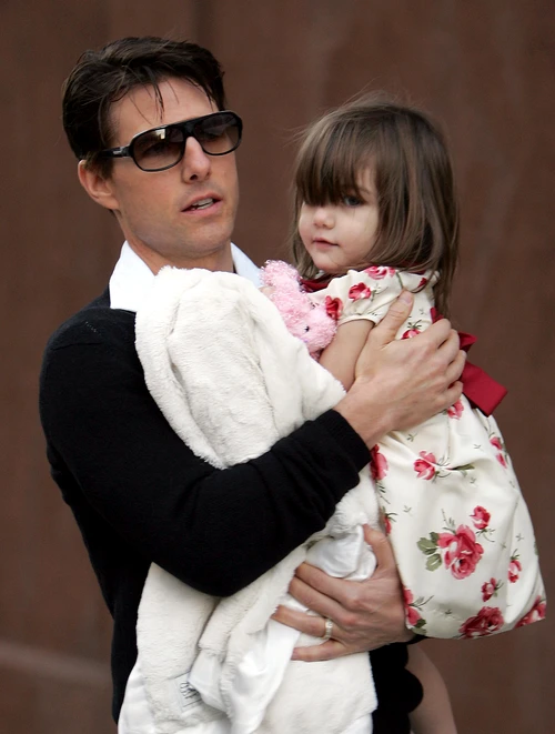 U S actor Tom Cruise and her children Suri leaves their apartment for strolling on the street jpeg