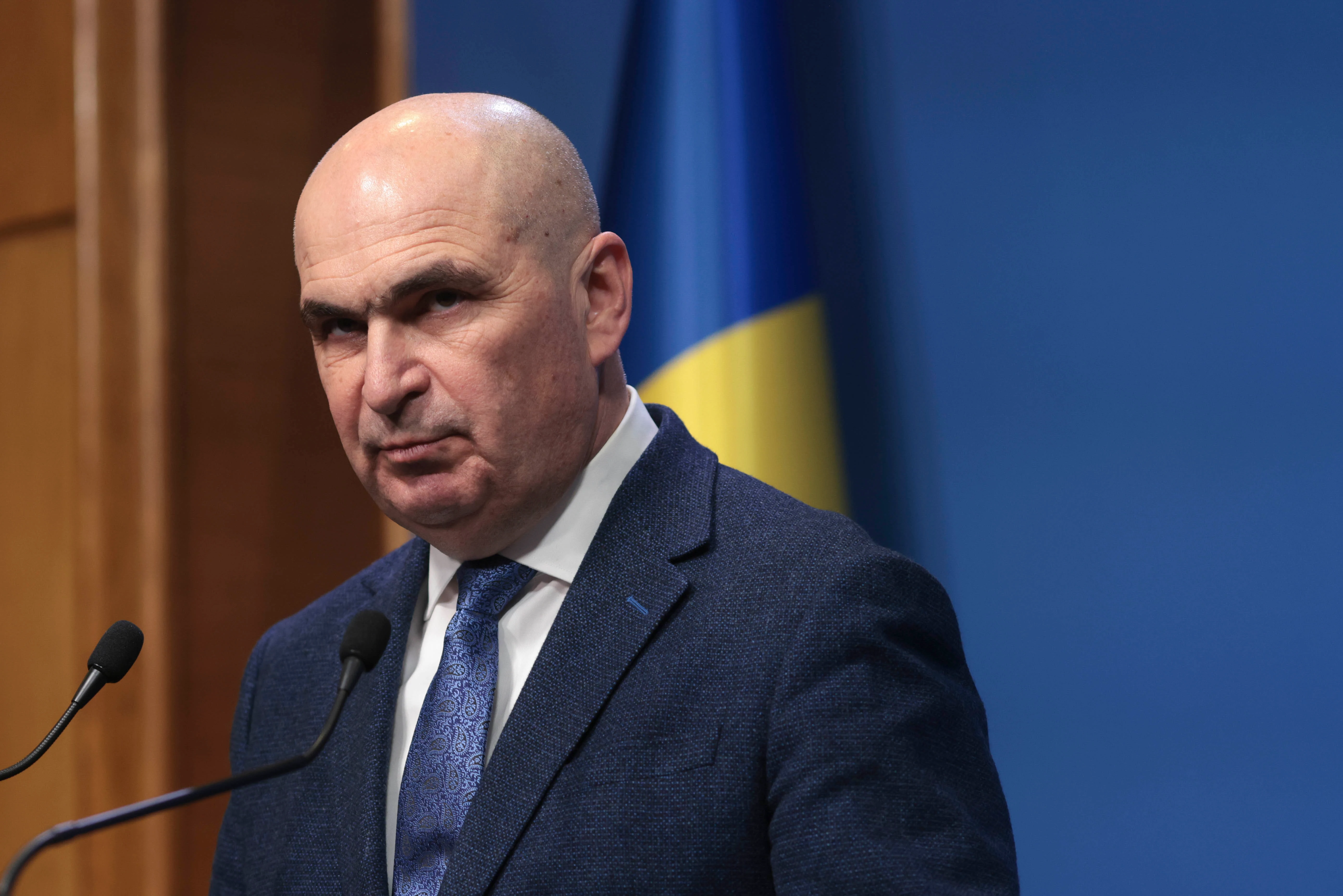 Controverse după reducerea sporului de doctorat: rectorii universităților contestă afirmațiile lui Bolojan: „Nu a fost adusă în discuție”