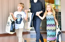 Angelina Jolie takes her children Knox and Vivian to buy their birthday gifts at a bookstore in studio city jpeg