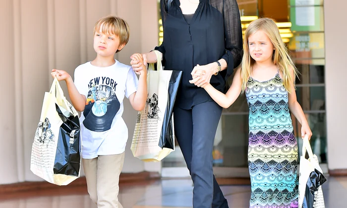 Angelina Jolie takes her children Knox and Vivian to buy their birthday gifts at a bookstore in studio city jpeg