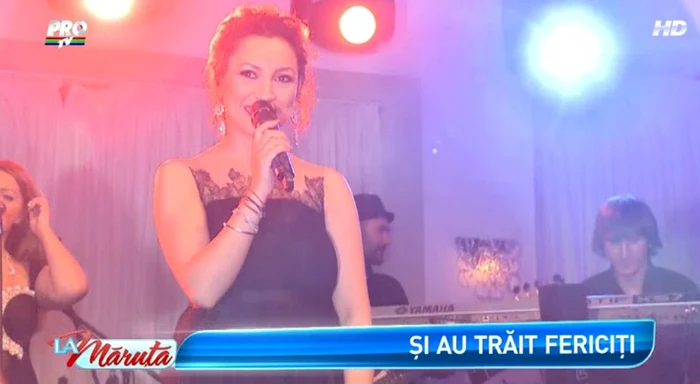 Andra a cântat cu tot dragul pentru cei doi miri