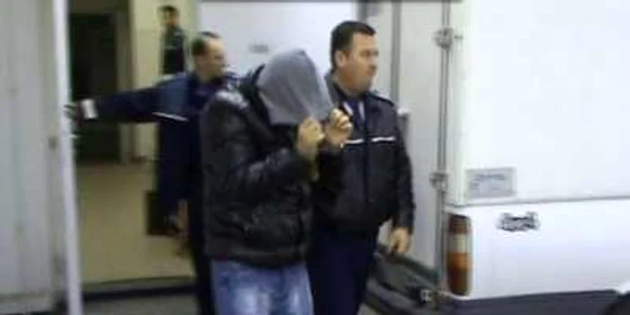 Titoaşcă a fost condus de poliţişti la arest