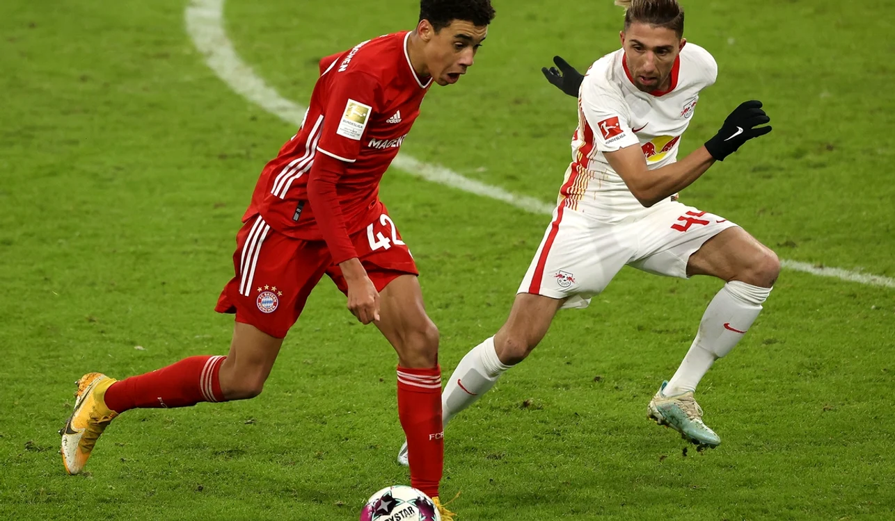 Kevin Kampl (dreapta) a încheiat cariera în Bundesliga pentru o viață mai simplă (FOTO: EPA)
