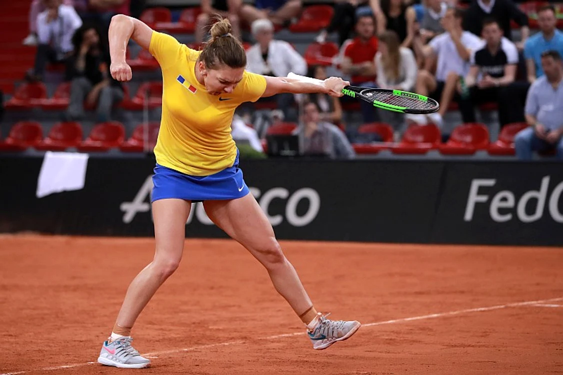 
    Simona Halep jubilează după victoria cu Caroline GarciaFoto: EPA-EFE  