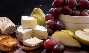 close up tasty brie cheese grapes jpg