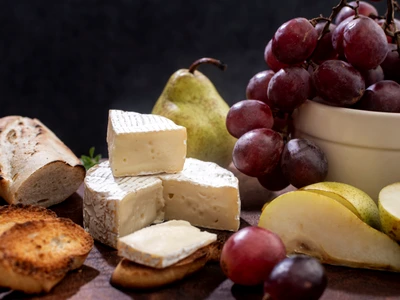 close up tasty brie cheese grapes jpg
