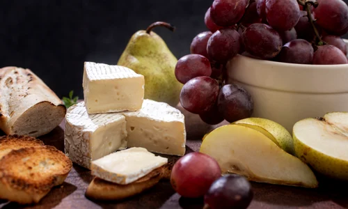 close up tasty brie cheese grapes jpg