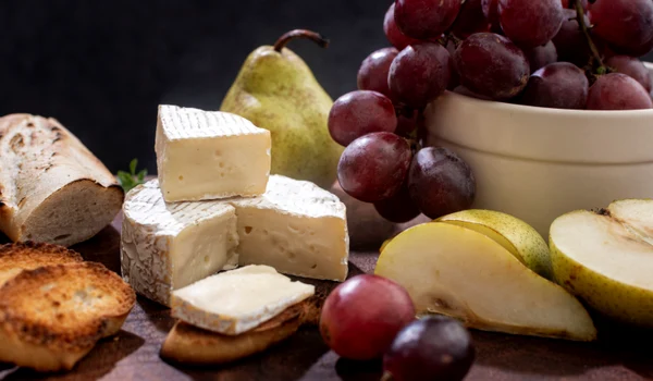 close up tasty brie cheese grapes jpg