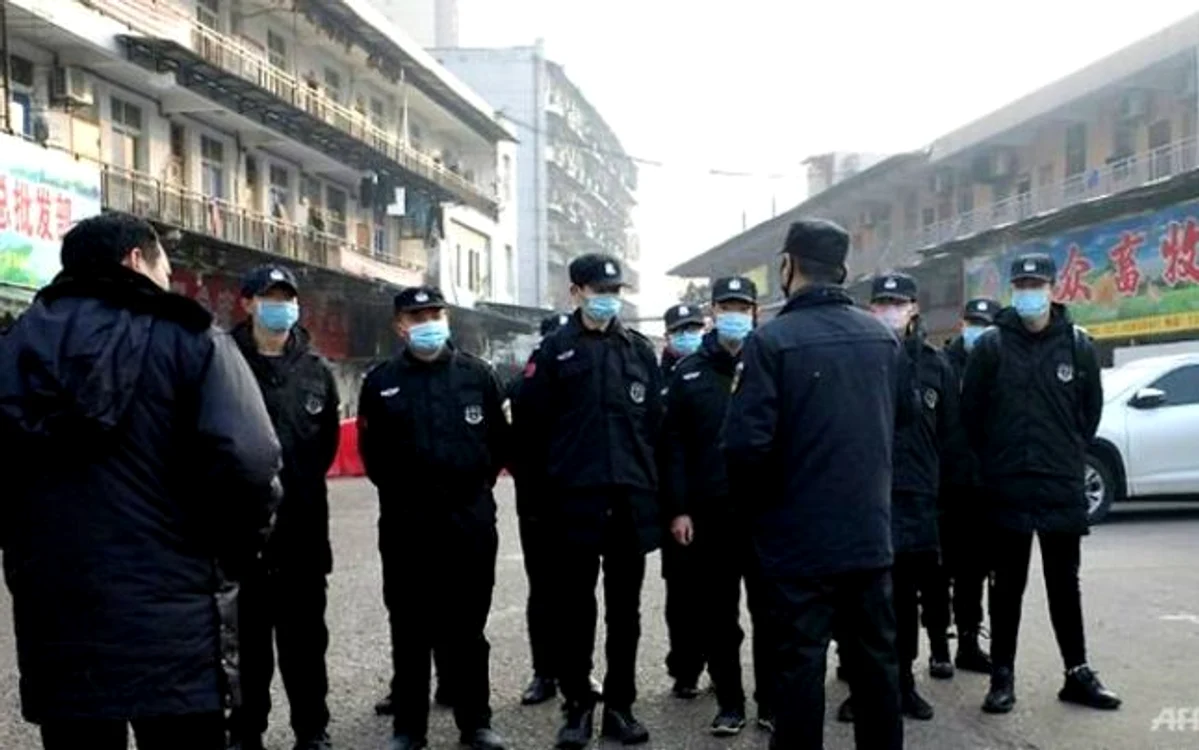 Un virus misterios a cauzat îmbolnăvirea a zeci de persoane în China FOTO AFP/Noel Celis