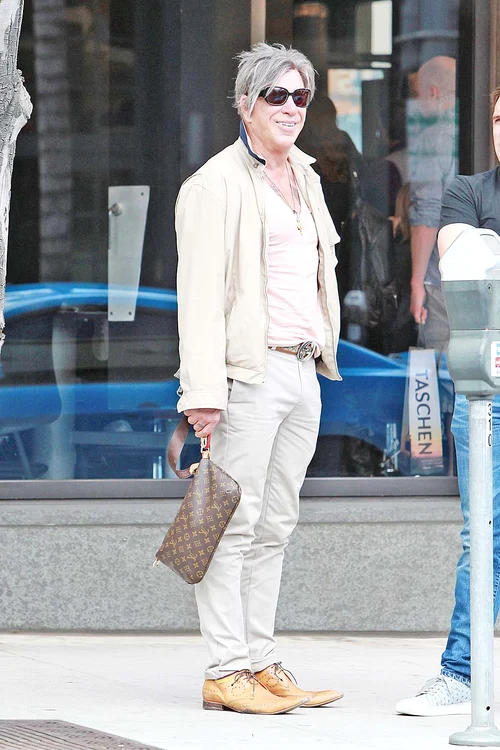Mickey Rourke  este de nerecunoscut  la 66 de ani