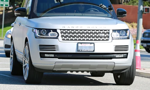 Exclusive    Kim Kardashian Breaking The Law While Driving jpeg