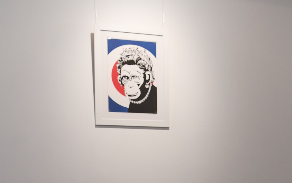O bătălie în instanță l-ar putea obliga pe misteriosul Banksy să-și dezvăluie numele real