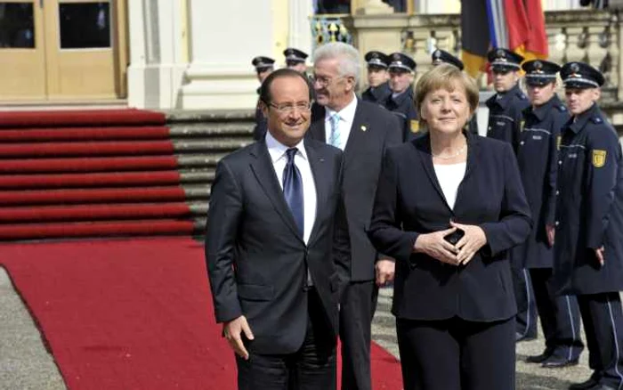 Cancelarul german Angela Merkel şi preşedintele francez Francois Hollande la întâlnirea de la castelul Ludwigburg FOTO: Mediafax