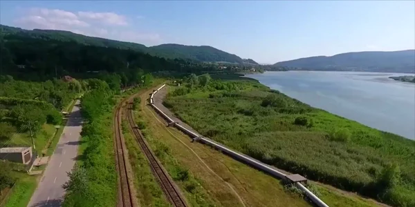 Centura Vâlcii zona pe unde ar urma să treacă văzută din dronă Sursă colaj YouTube 19Railtrain95 mp4 thumbnail png