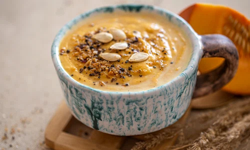 delicious composition with pumpkin soup beautiful ceramic dish seasonal food jpg