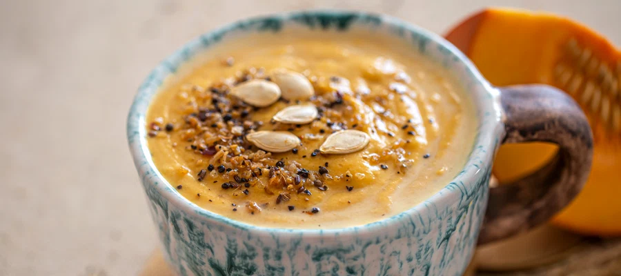 delicious composition with pumpkin soup beautiful ceramic dish seasonal food jpg