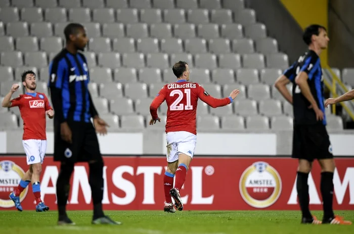 
    Vlad Chiricheş se bucură după golul marcat la Bruges  