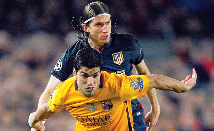 
    Luis Suarez  pa câştigat duelurile  cu Filipe Luis prin  orice mijloaceFoto: Getty Images  