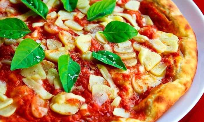 Pizza vegetariană este recomandată persoanelor care țin la siluetă