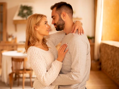 side view couple holding each other jpg