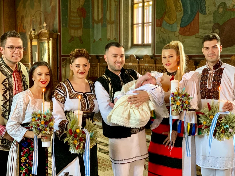 Imagine superbă de la botezul tradițional din Bucovina