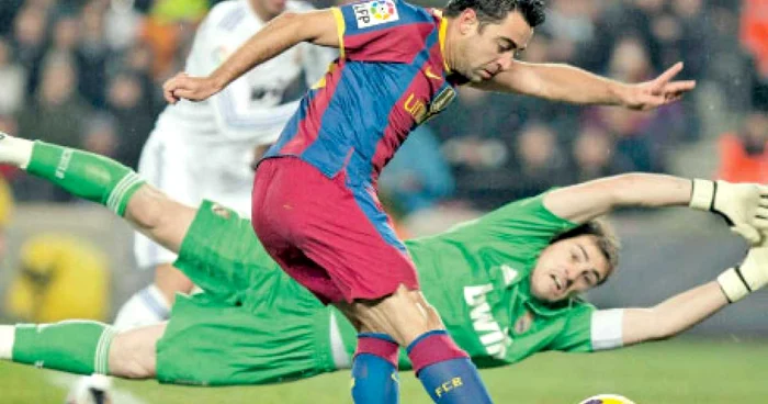 În ciuda plonjonurilor sale, Casillas n-a reuşit să-i oprească pe Xavi şi pe colegii lui 