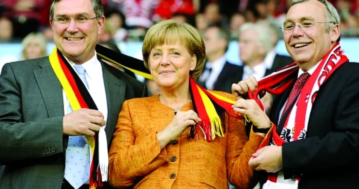 Merkel, între meci şi UE