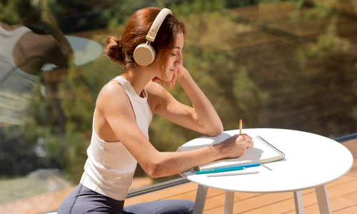 woman home listening music drawing jpg