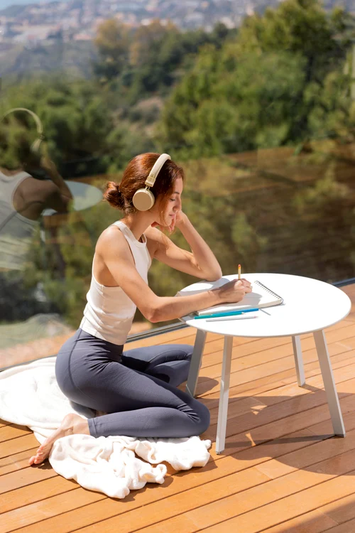 woman home listening music drawing jpg