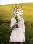 young woman with gladiolus nature jpg