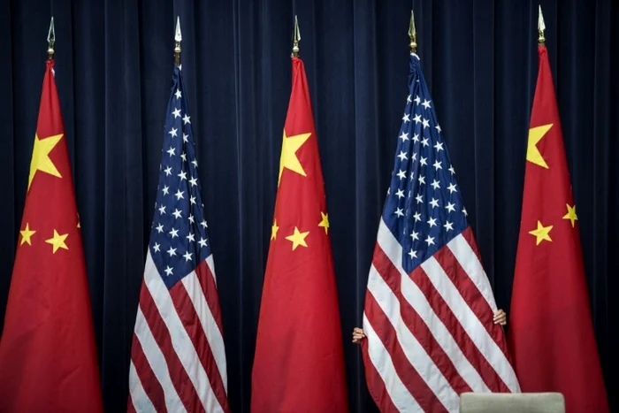 Reprezentanții americani și chinezi vor purta discuții în Elveția FOTO AFP