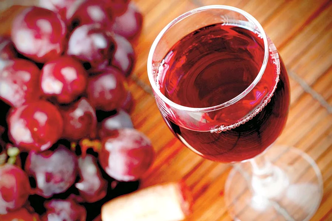 
    Vinul roşul previne cariile  