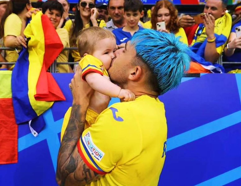 Generația de suflet are viitor: Andrei Rațiu și-a sărutat bebelușul în fața zecilor de mii de fani. „O fotografie cât 1.000 de cuvinte”