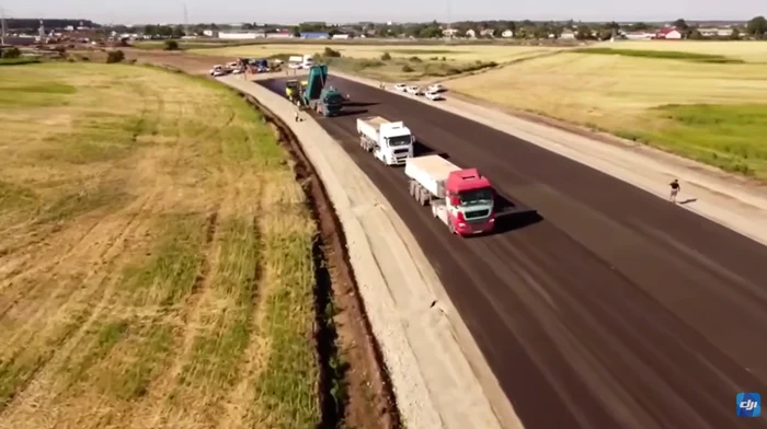 Au început lucrările de asfaltare pe Centura Buftea. FOTO: captură video YouTube
