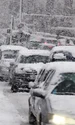 Mașini blocate în trafic de ninsoare - vremea - meteo - ninge FOTO Shutterstock 