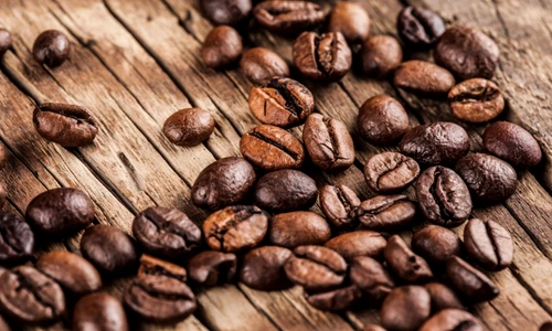 39362403   coffee on wooden background jpeg
