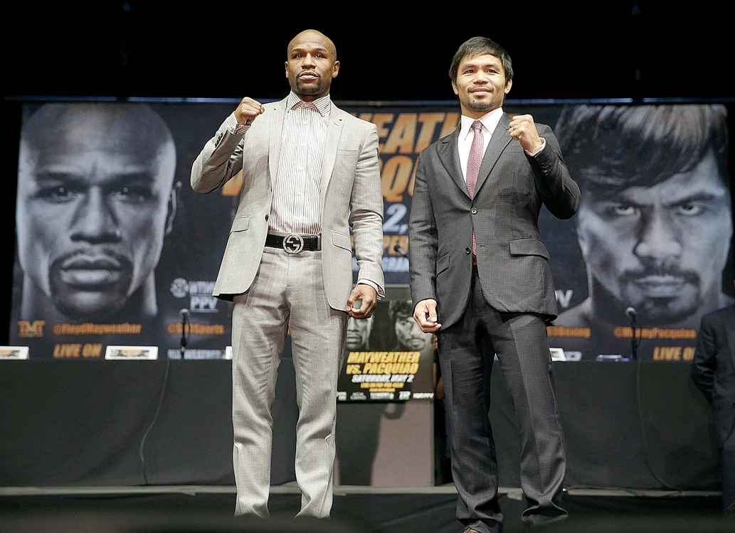 Floyd Mayweather şi Manny Pacquiao la singura lor întâlnire directă de dinaintea meciului din 2 maiFOTO: AP