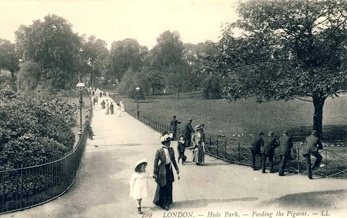 london hyde park old photo of people feeding pigeons jpg jpeg