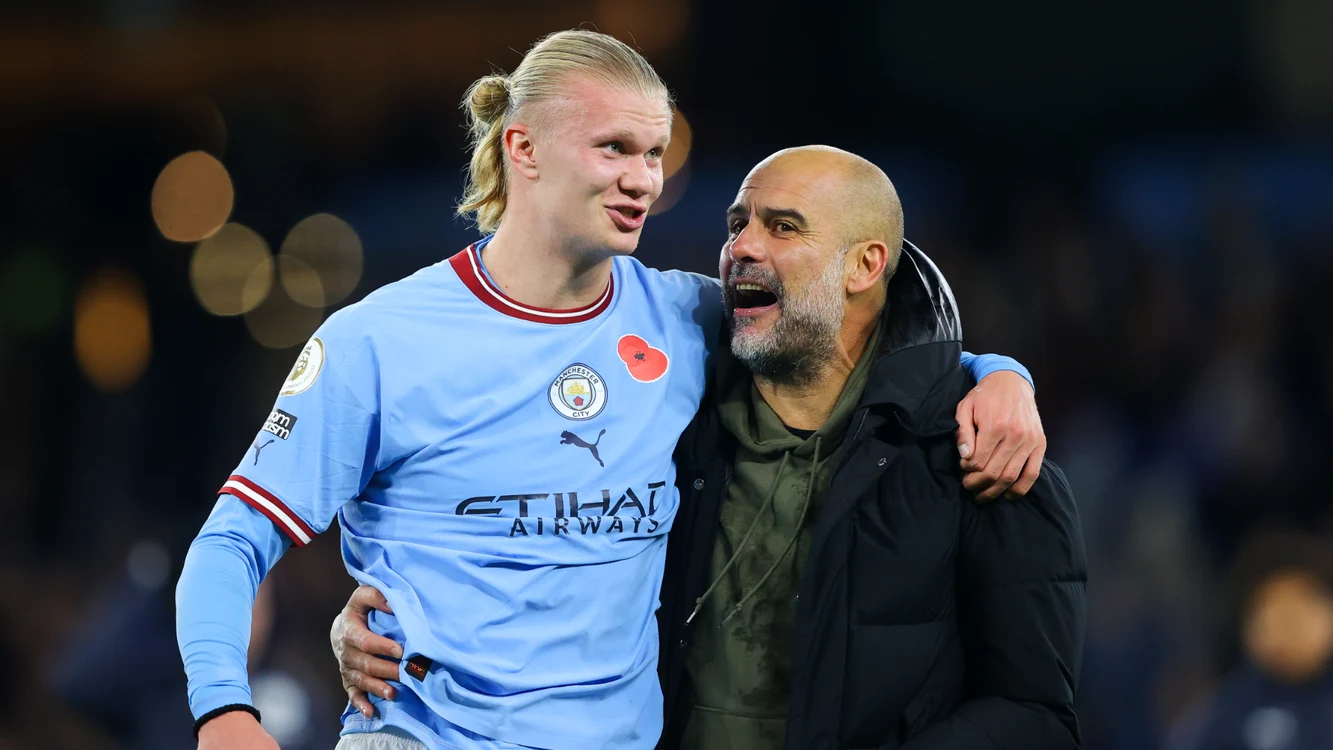Erling Haaland, alături de Josep Guardiola