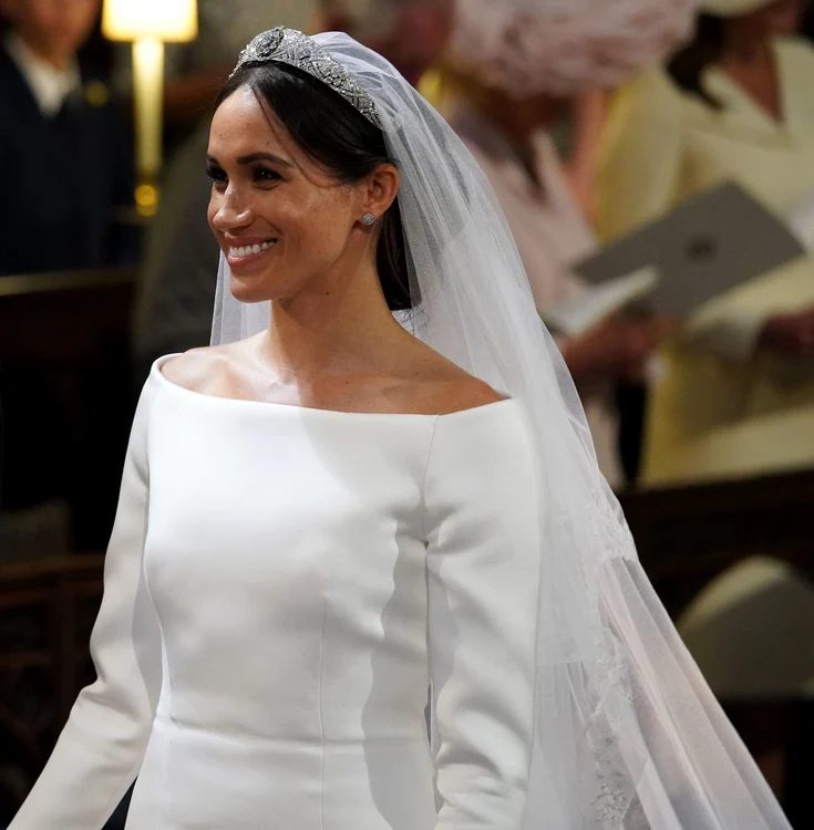 Meghan Markle s-a situat pe locul doi în tp datorită rochiei de mireasă, însă nu a reuşit să o învingă pe Kate Middleton